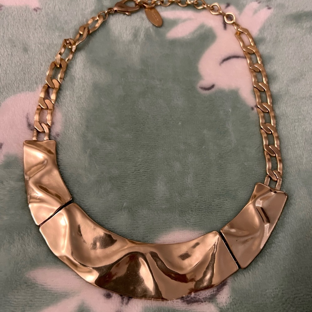 Gold colored necklace
